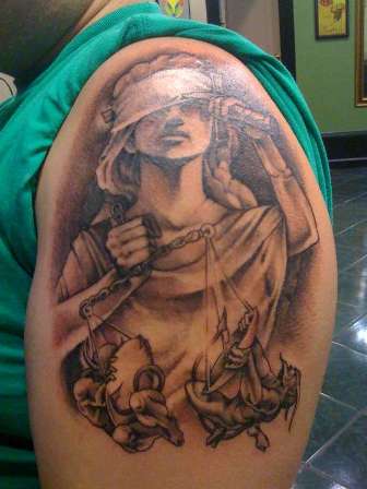 lady-justice-tattoo-on-shoulder-for-guys